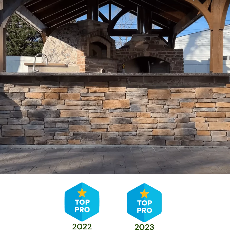 Bluestone landscaping finished outdoor kitchen for about section