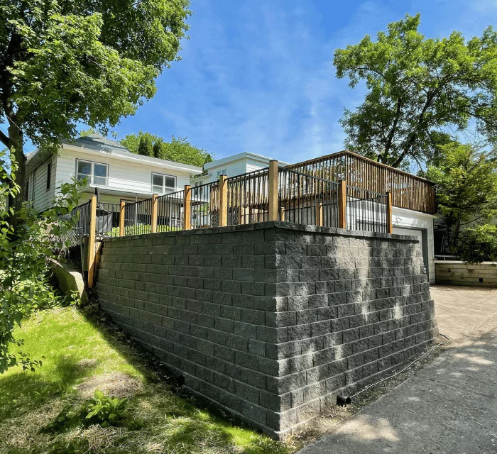 Landscaping Lakeville MN - stone retaining wall for backyard elevation