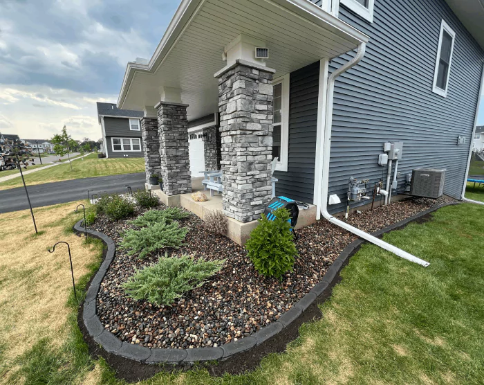 Landscaping Lakeville MN - decorative rock and mulch in front yard